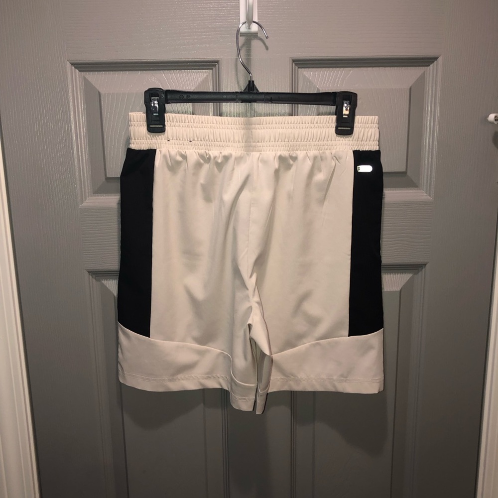 White and black athletic shorts.
